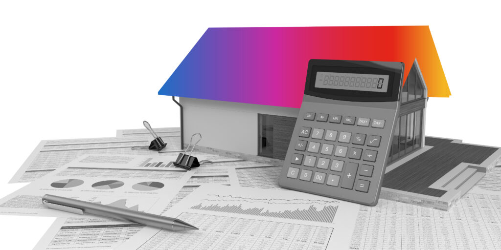 calculadora apoyada en una casa con tejado de colores
